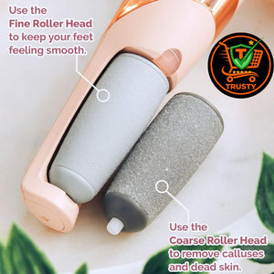 Hand holding a 'Flawless' foot callus remover with decorative items in the background