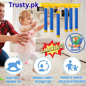 Kids Playing Trusty Catching Sticks Game with Adult Assistance – Reflex & Hand-Eye Coordination Toy for Kids & Adults in Pakistan at Trusty.pk